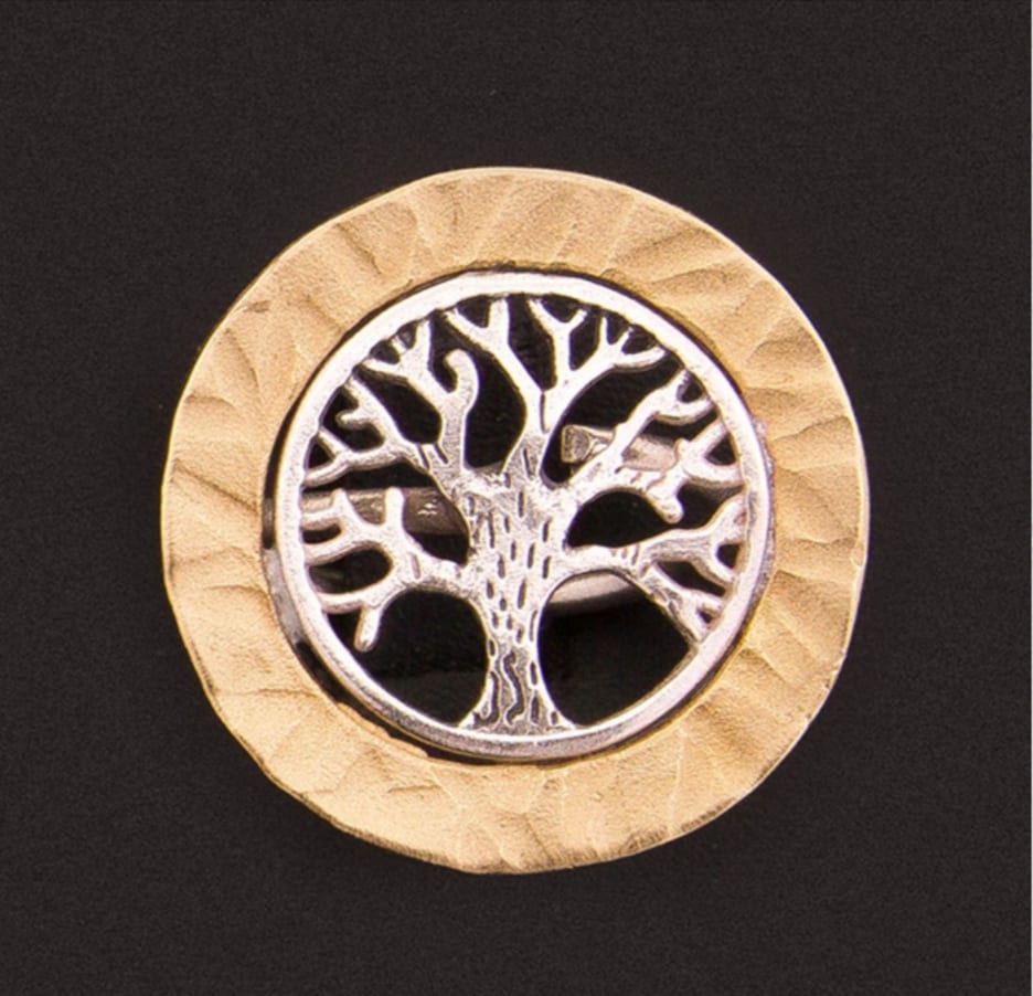 Ring with the tree of life design in silver and gold color