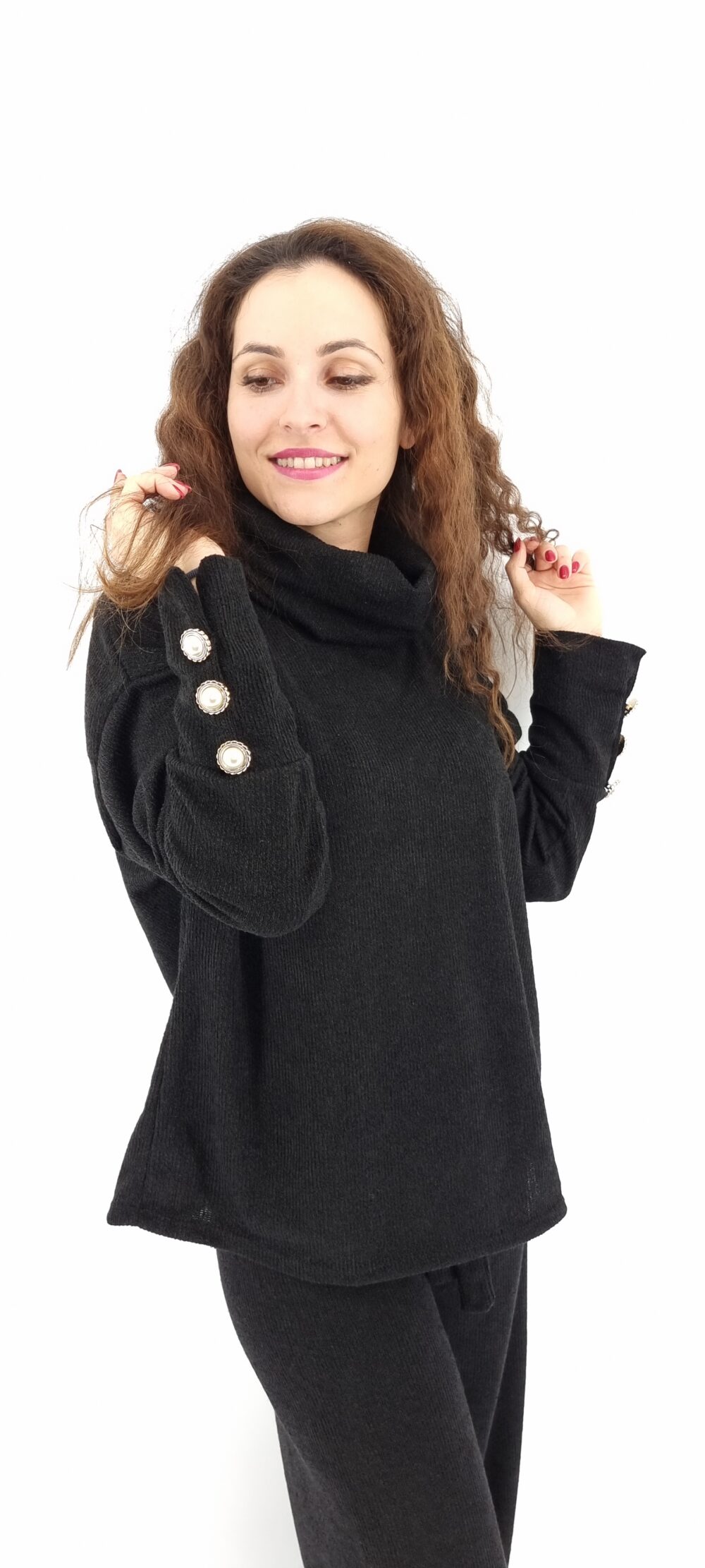 Knitted plaid with decorative buttons on the sleeves black
