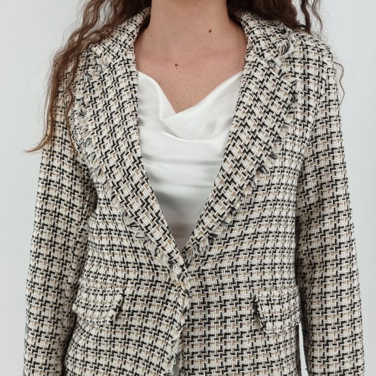 Colorful knitted jacket with a gold button beige