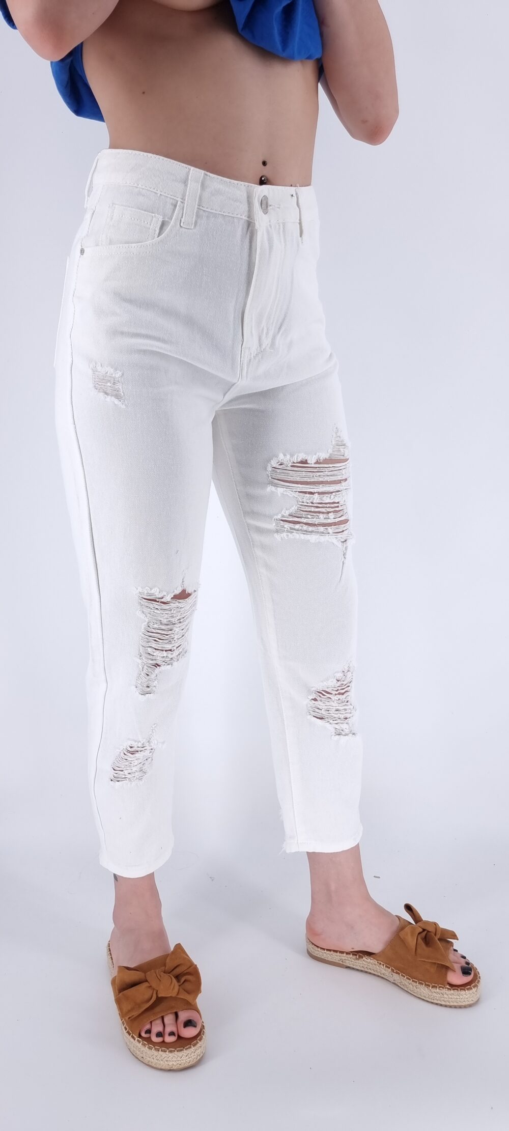 White jeans with tears